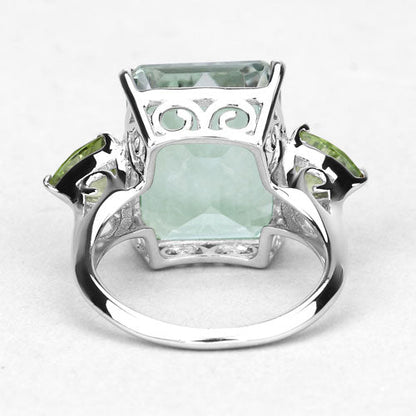 Ring with cushion-cut green amethyst centerpiece and peridot accents in .925 silver on Tampa Home & Garden Store