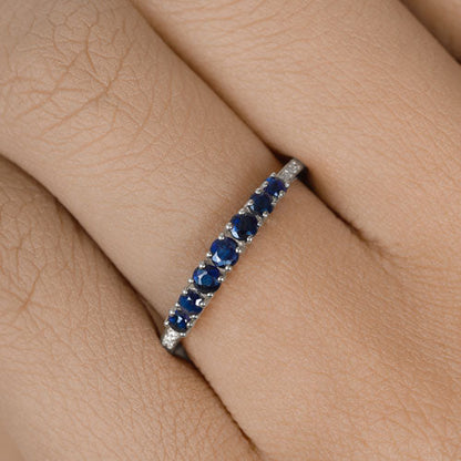 Blue sapphire and white diamond ring on finger, 14K white gold band, 0.45ct sapphires, Bids.com on Tampa Home & Garden Store