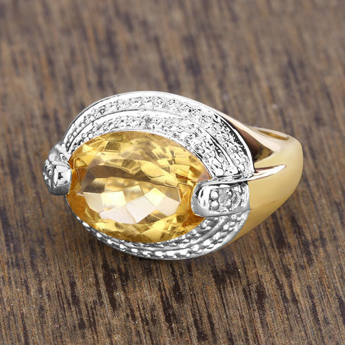 Citrine and diamond ring with oval citrine centerpiece and diamond halo on gold and silver band on Tampa Home & Garden Store