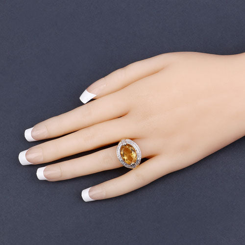 Ring by Bids.com: 4.56ct genuine citrine with white diamond halo in .925 sterling silver on Tampa Home & Garden Store