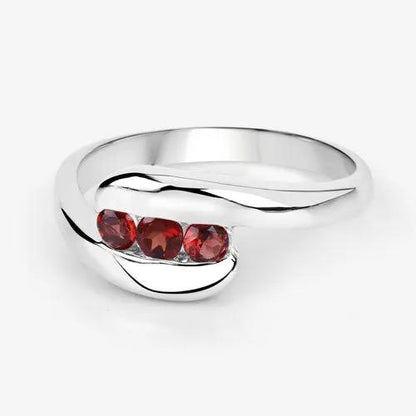 Sterling silver garnet ring with three red stones on a curved band 0.74ct on Tampa Home & Garden Store