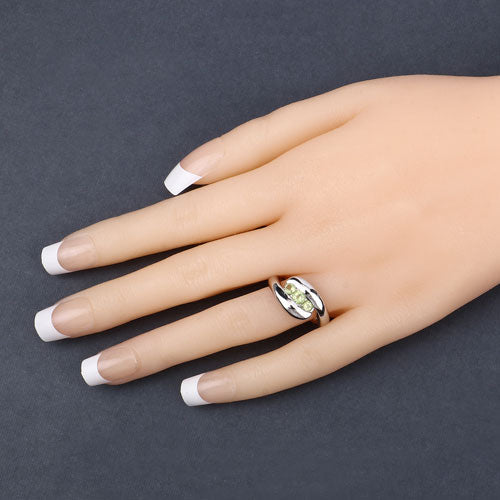 Peridot ring, 0.56ct green peridot in .925 sterling silver with curved split-band on finger on Tampa Home & Garden Store