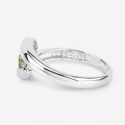 Genuine 0.56ct peridot ring in .925 sterling silver with accent stones on band by Bids.com on Tampa Home & Garden Store