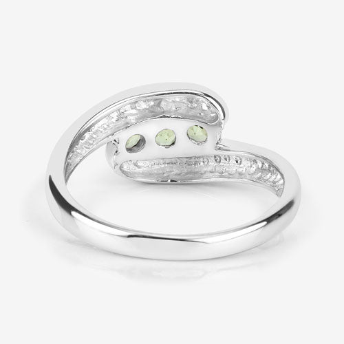 Ring in .925 sterling silver wrap design with 0.56 carat peridot and inner stones on Tampa Home & Garden Store
