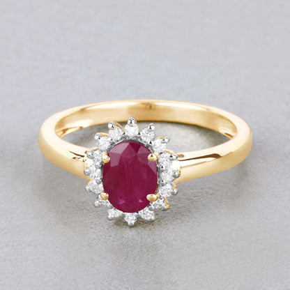 Ring 10K yellow gold with oval ruby centerpiece and diamond halo, Bids.com on Tampa Home & Garden Store