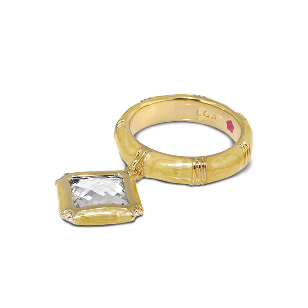 Prince Charming Ring cushion-cut clear stone on ridged gold band with LGA inscription on Tampa Home & Garden Store