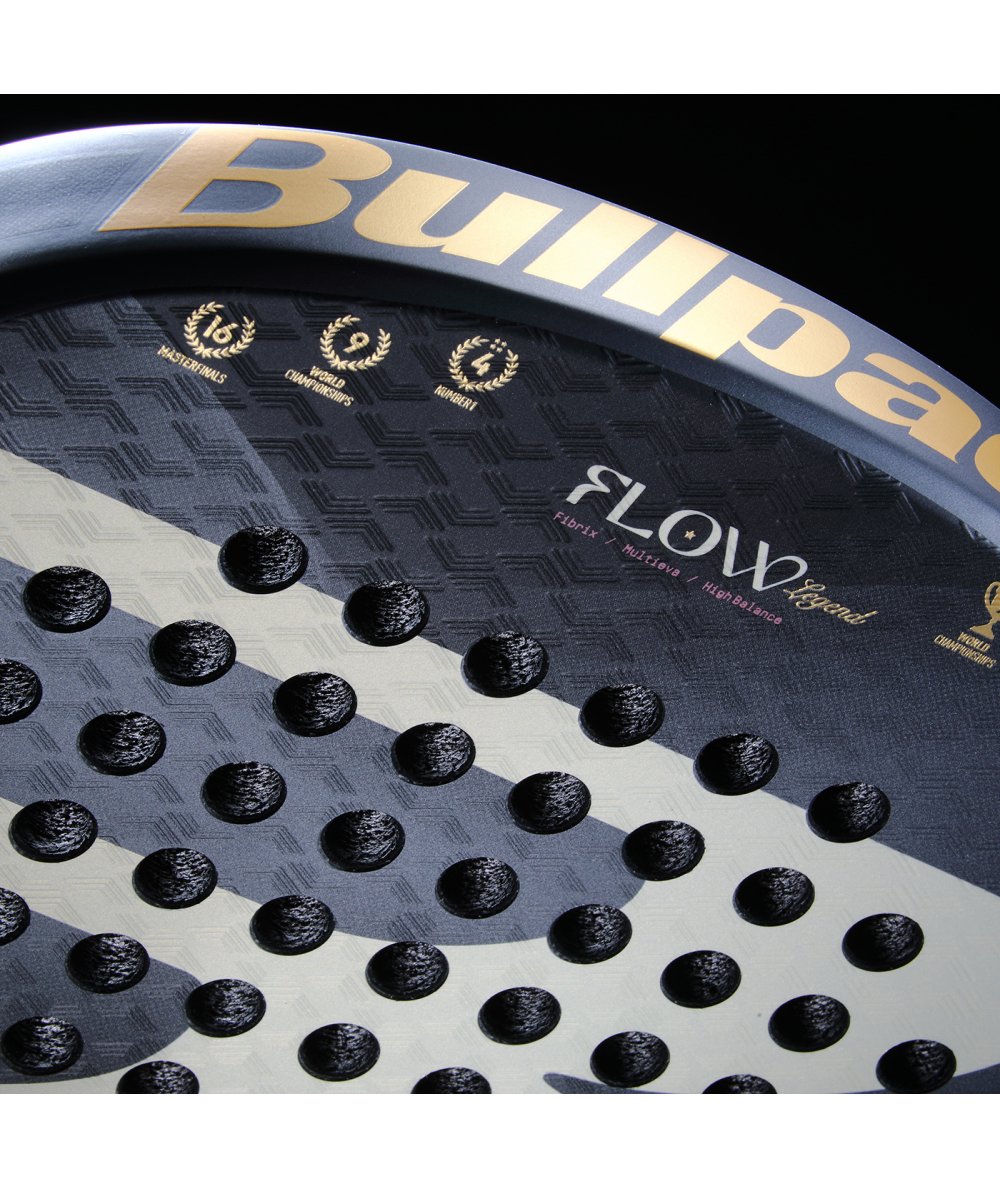 Padel racket Bullpadel Flow Legend 26 close-up in blue-grey with gold logo and dotted surface on Tampa Home & Garden Store