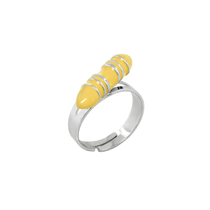 Ring with yellow crayon centerpiece wrapped by four silver bands on a silver band on Tampa Home & Garden Store