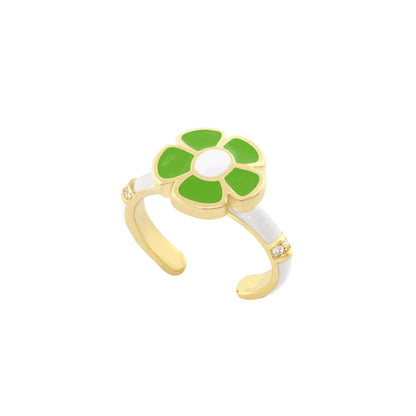Hu La La Child's Ring gold flower with green enamel petals white center on white band on Tampa Home & Garden Store