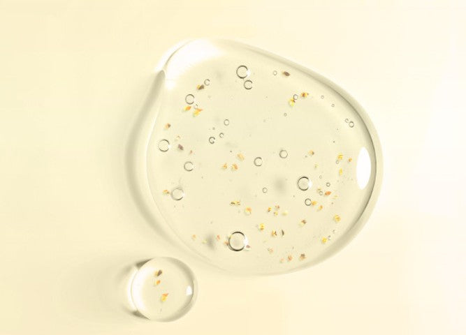 Re:NK Treatment Nourishing Serum 30ml by Seoulia with two clear droplets and botanical specks on Tampa Home & Garden Store