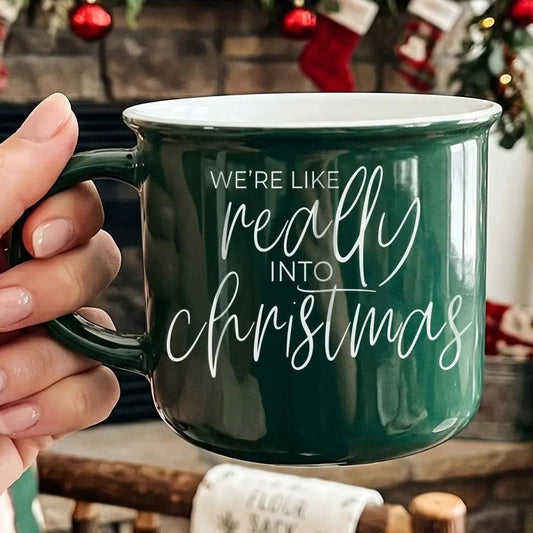 Gia Roma coffee mug green ceramic with white script we're like really into christmas on Tampa Home & Garden Store