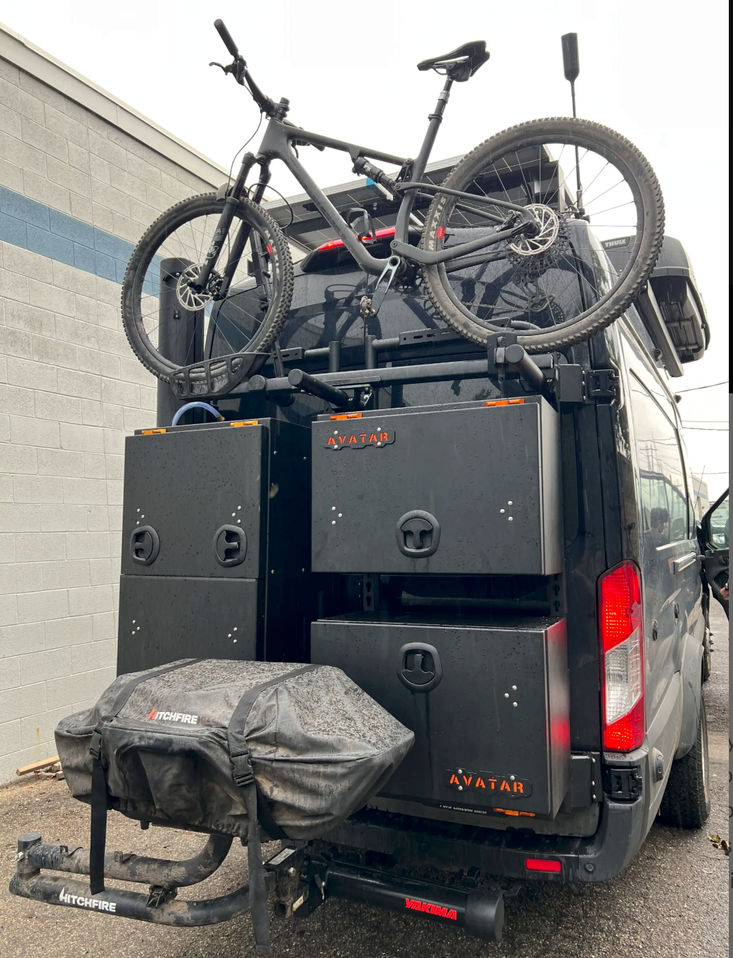 Bike Posts for Massif mount on black van with Avatar offroad storage boxes and bike rack on Tampa Home & Garden Store