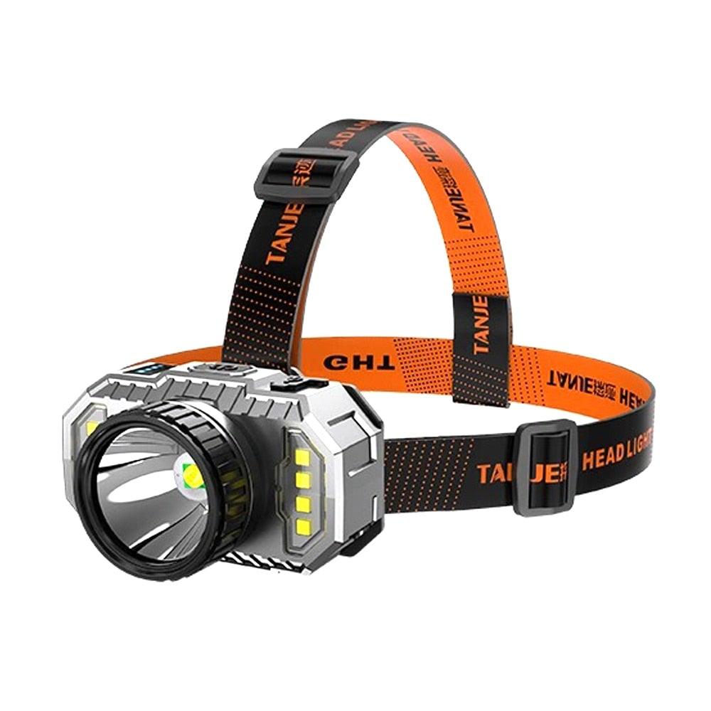 Stevvex rechargeable LED headlamp with long-range beam, rugged head unit and orange/black strap on Tampa Home & Garden Store