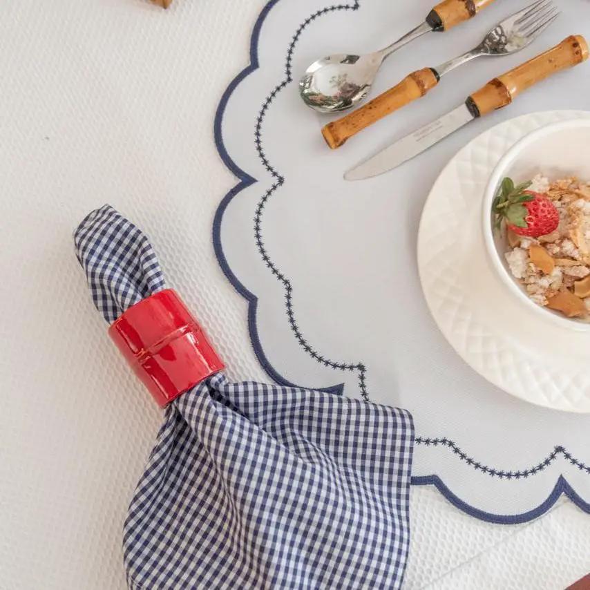 Brazilian Bamboo Napkin Ring by Talah Home with red accent on navy gingham napkin on table on Tampa Home & Garden Store
