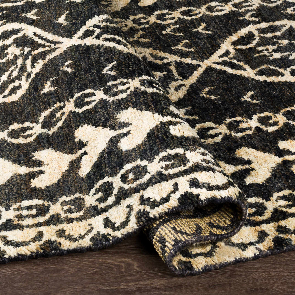 Redondo premium hand knotted jute carpet with black beige geometric pattern, stacked rugs on Tampa Home & Garden Store