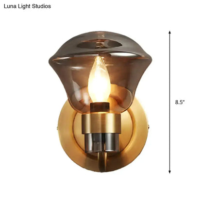 Retro brass wall sconce with smoke gray amber glass shade by Decorbites on Tampa Home & Garden Store