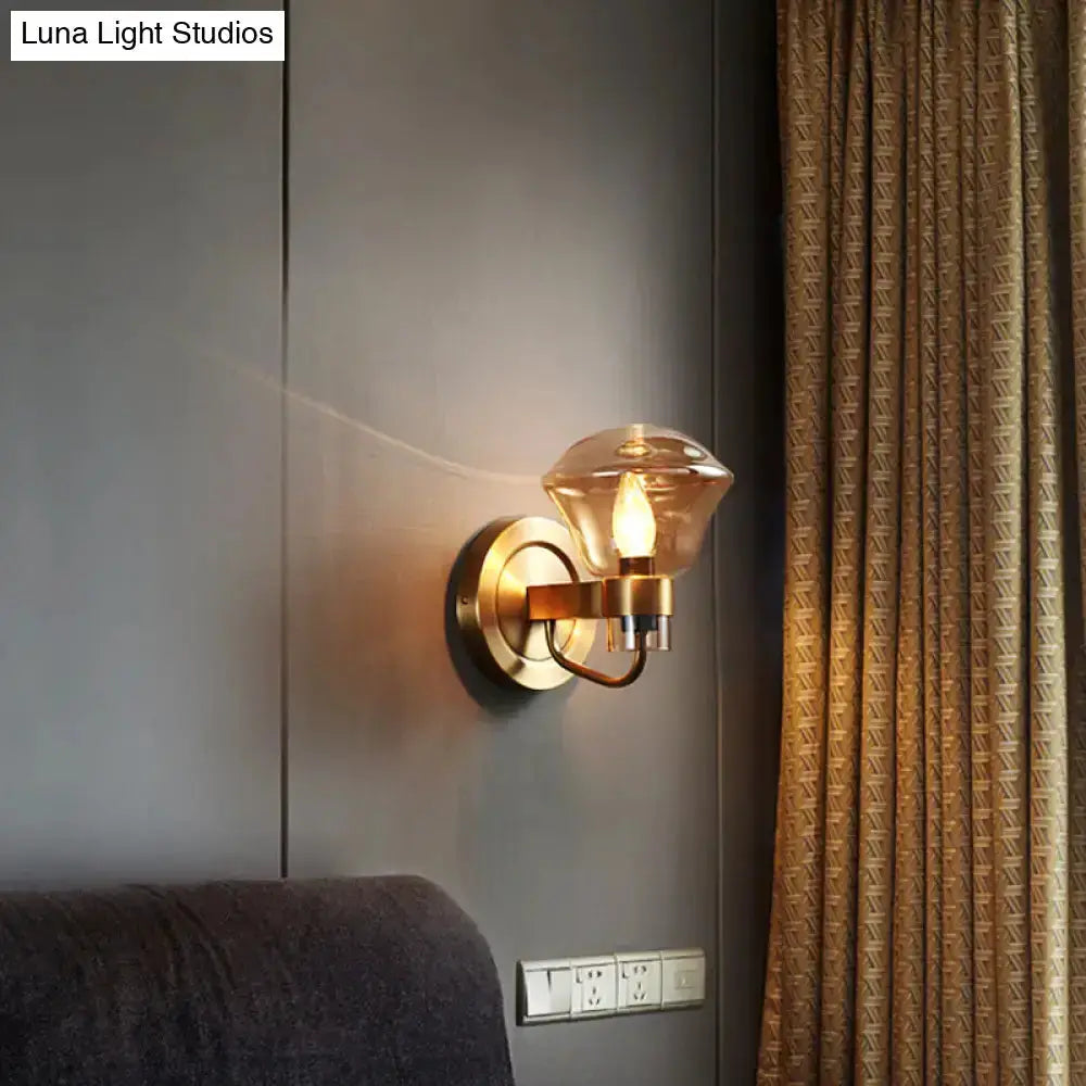 Decorbites retro brass wall sconce with amber glass shade and smoke gray finish on Tampa Home & Garden Store