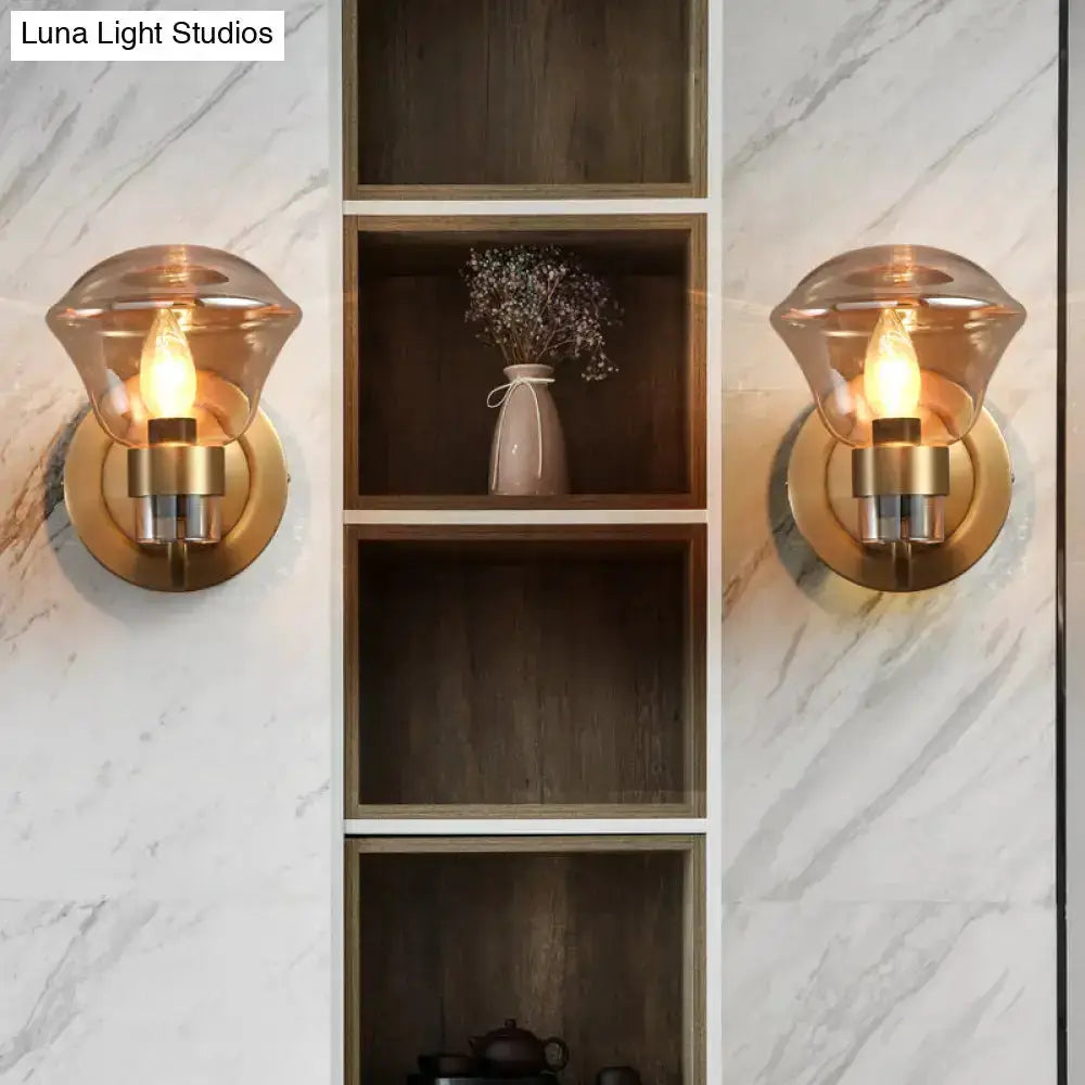Pair of Decorbites brass wall sconces with smoke gray amber glass shades for bedroom decor on Tampa Home & Garden Store
