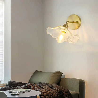 Copper glass wall sconce with brass backplate and flower-shaped shade, wall-mounted on Tampa Home & Garden Store