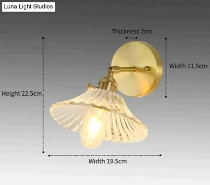 Copper Glass Wall Sconce by Decorbites with copper finish and ribbed glass shade on wall mount on Tampa Home & Garden Store