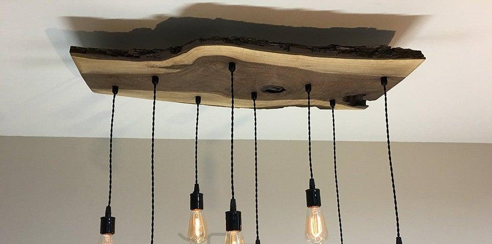 Wooden ceiling beam pendant light with six vintage Edison filament bulbs on black cords on Tampa Home & Garden Store