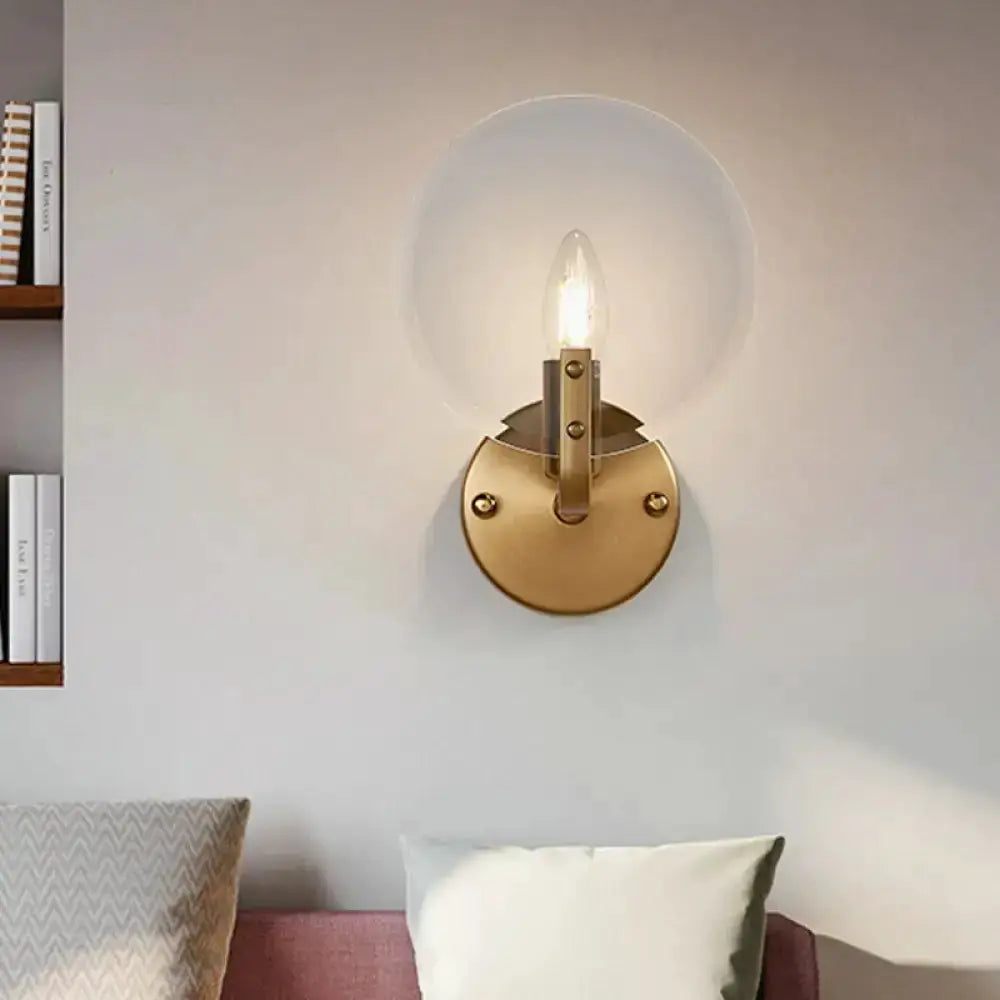Decorbites retro gold brass glass sconce with circular backplate and exposed bulb on wall on Tampa Home & Garden Store