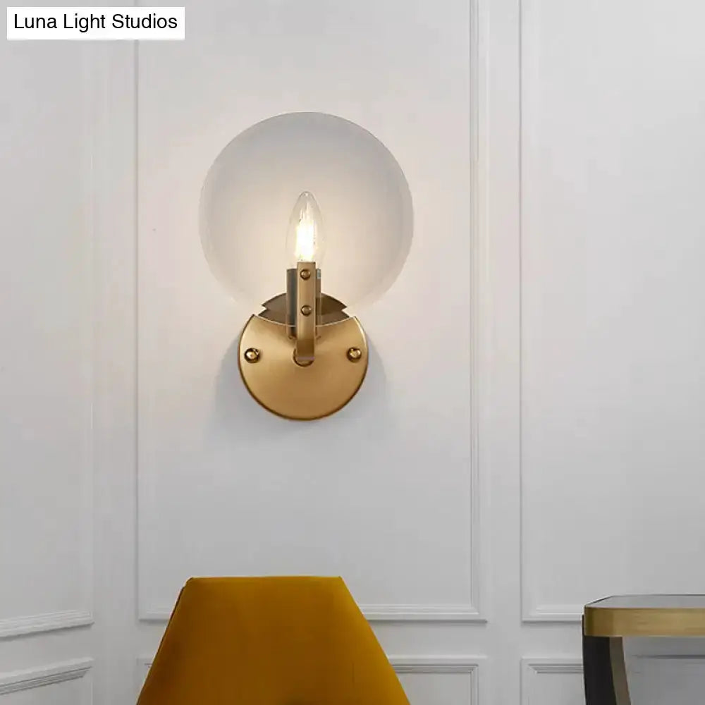 Retro gold and blue glass sconce light with clear glass globe shade brass mount on wall on Tampa Home & Garden Store