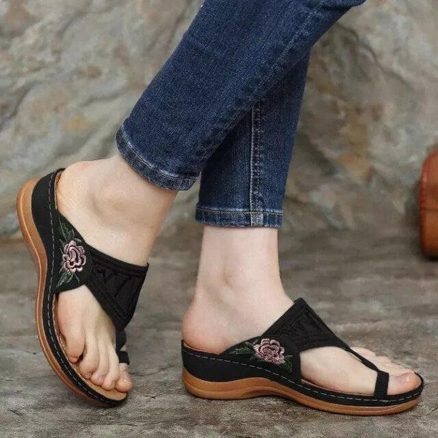 Stevvex black cross-band floral embroidery sandals, open toe, brown sole, pair on Tampa Home & Garden Store