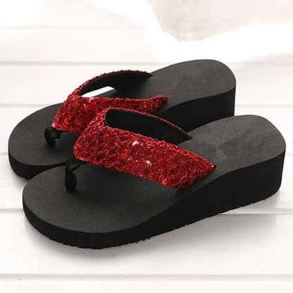 Rhinestone women flip flops with red glitter straps on a black platform sole on Tampa Home & Garden Store