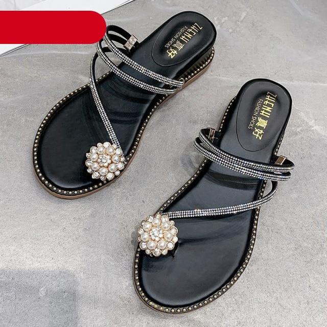Rhinestone sandals by Stevvex with crystal flower toe ornament, black strappy flats pair on Tampa Home & Garden Store
