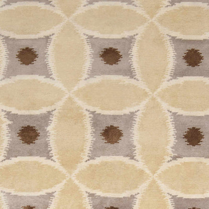 Rindge Area Carpet by Boutique Rugs; beige and taupe geometric diamonds with brown centers on Tampa Home & Garden Store