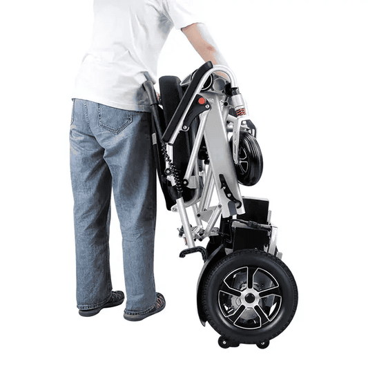 Folding electric wheelchair DONJOHNSTYLE4URHOME, folded metal frame and black seat on Tampa Home & Garden Store