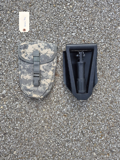 Gerber folding entrenching shovel with black steel head beside camo carry pouch on Tampa Home & Garden Store