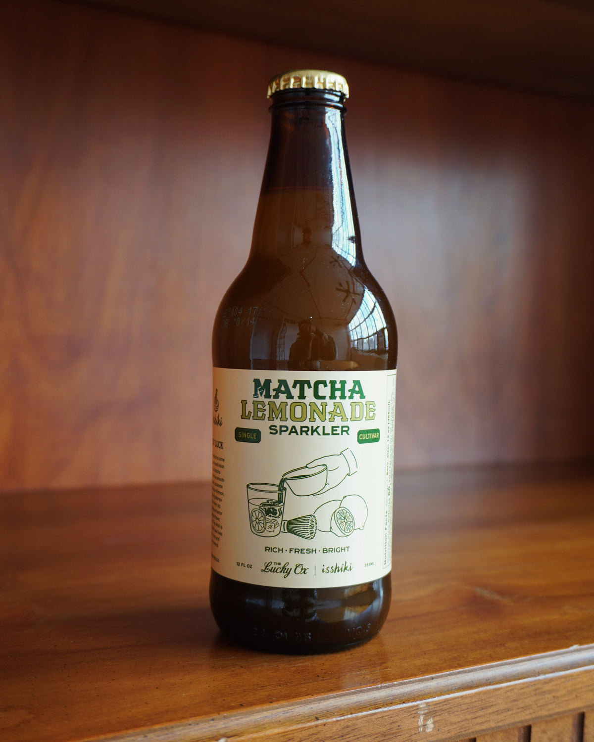 Matcha Lemonade Sparkler soda bottle with brown glass and white label isshiki matcha on Tampa Home & Garden Store