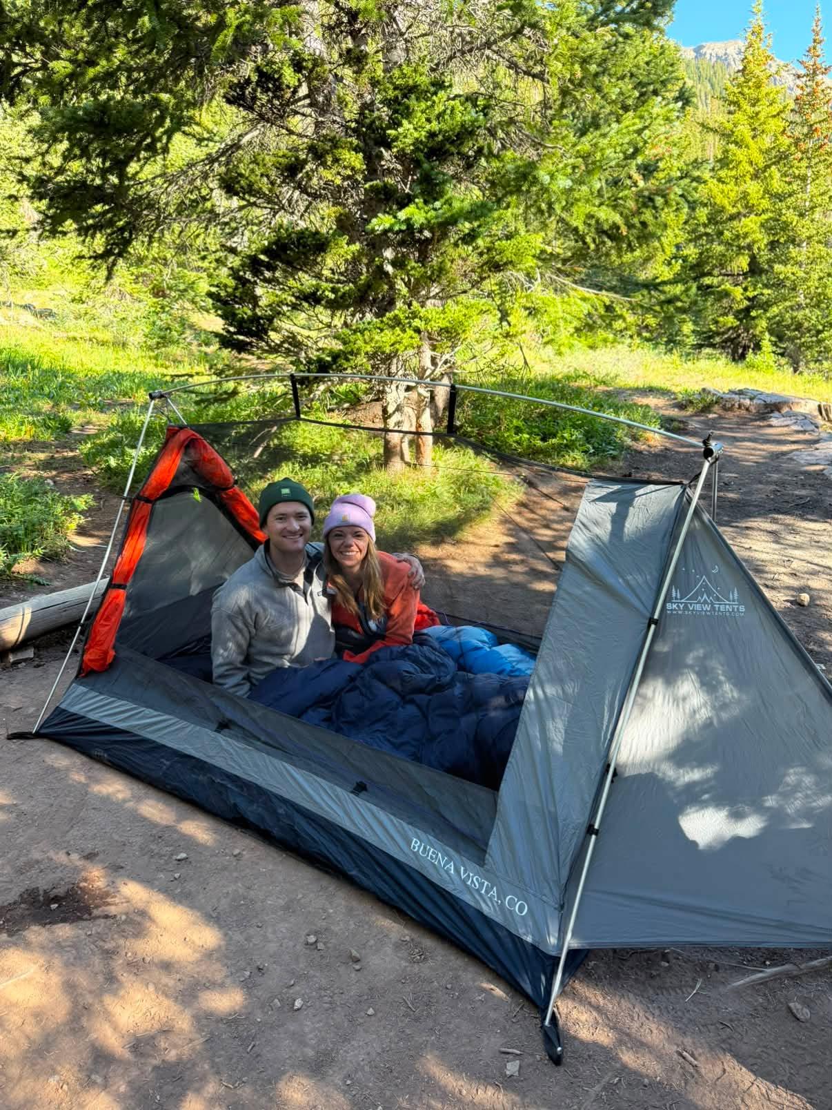 Sky View Duo Tent gray tent with red rain fly and sleeping bags Sky View Tents logo on Tampa Home & Garden Store