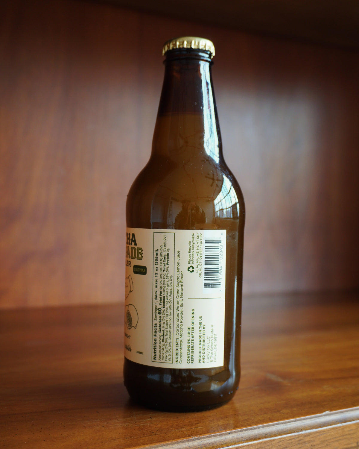 Matcha Lemonade Sparkler bottle in brown glass with white label by isshiki matcha on Tampa Home and Garden Store