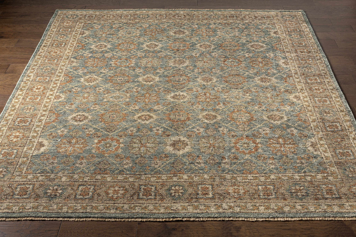 Rockton Area Rug Boutique Rugs - Clearance, blue gray field with tan motifs and fringe border on Tampa Home & Garden Store