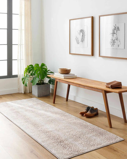 Pointblank tan leopard print rug runner by Boutique Rugs in a bright entry with a bench on Tampa Home & Garden Store