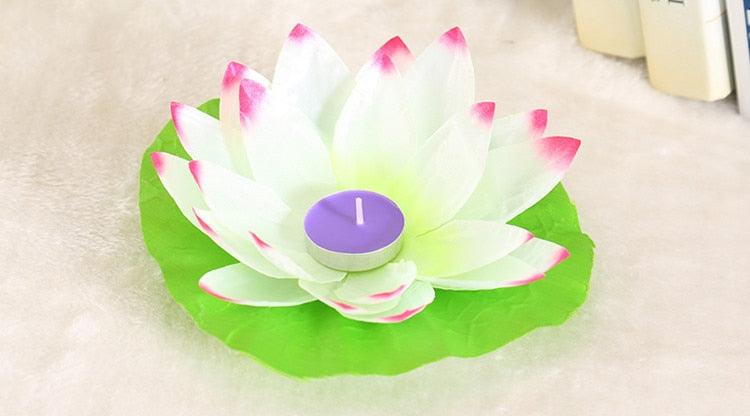 Floating lotus LED candle with purple tea light on green lotus leaf Stevvex flameless light on Tampa Home & Garden Store