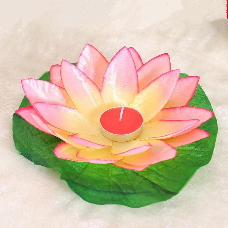 Lotus floating candle with pink-to-yellow petals on a green leaf base, battery-powered flameless LED candle on Tampa Home & Garden Store