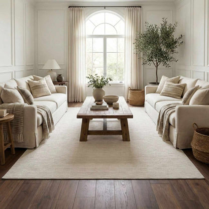 Kazuma Cream Checkered Washable Area Rug Boutique Rugs cream tone under rustic wood coffee table on Tampa Home & Garden Store