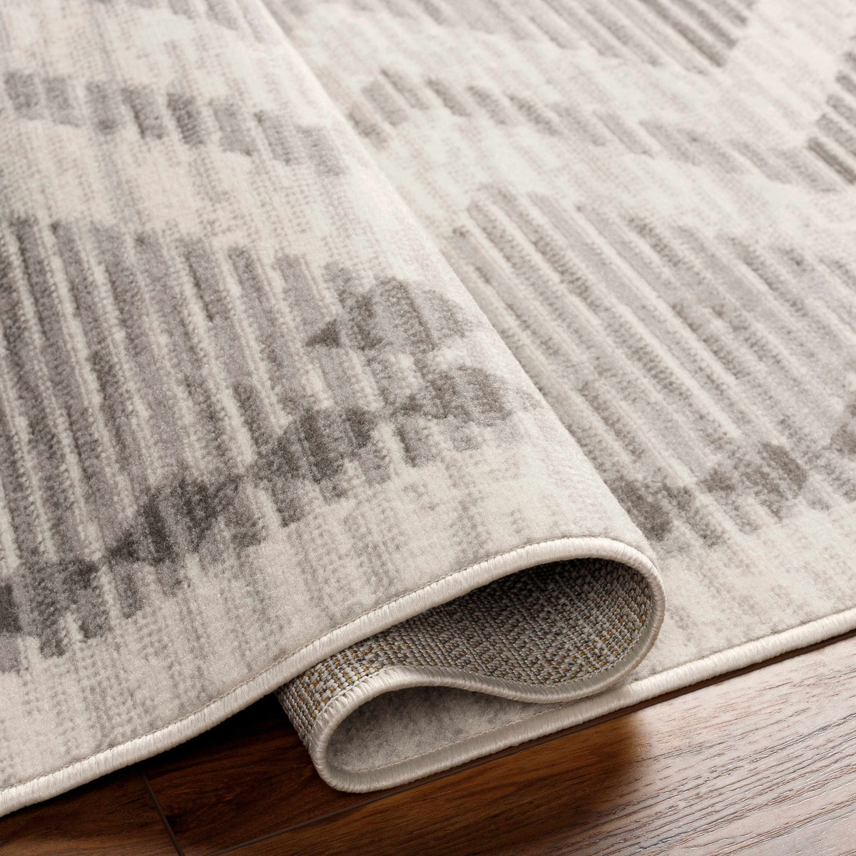 Rory Area Rug by Boutique Rugs in soft gray beige abstract pattern, plush pile on Tampa Home & Garden Store