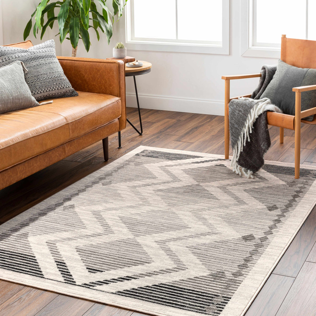 Rory Area Rug by Boutique Rugs in gray and black striped geometric pattern on Tampa Home & Garden Store