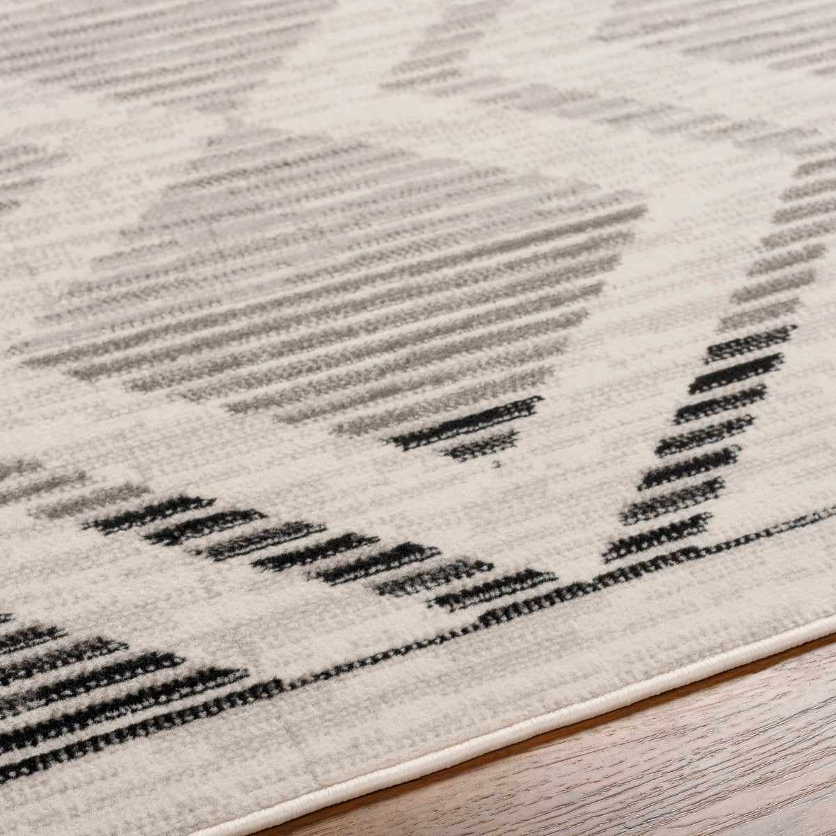 Rory Area Rug by Boutique Rugs in neutral beige gray abstract pattern on Tampa Home & Garden Store