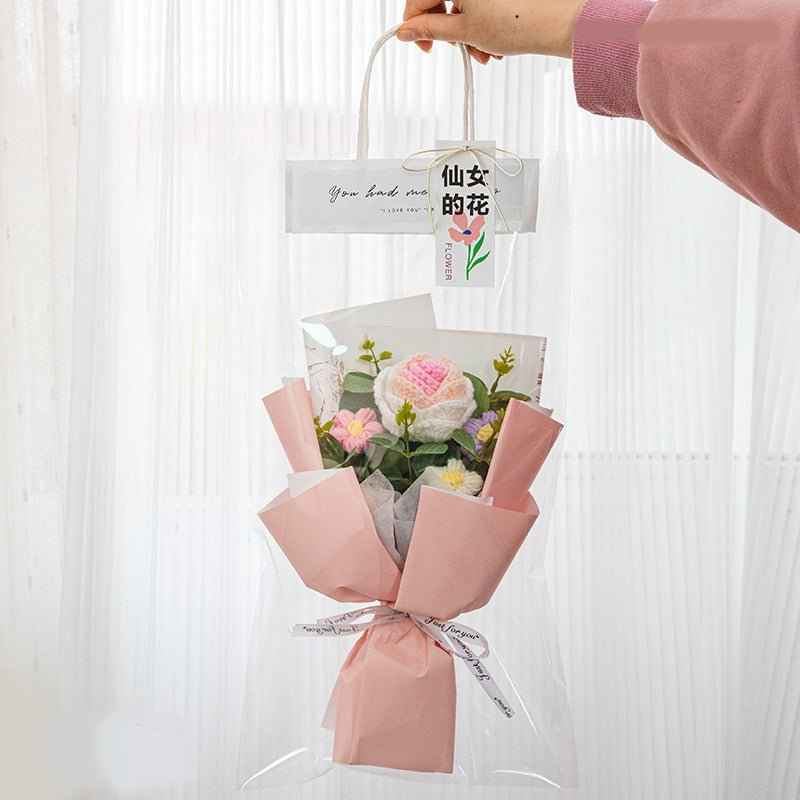 Crochet Rose Bouquet by Shaketea with pink wrap and pastel artificial blooms on Tampa Home & Garden Store