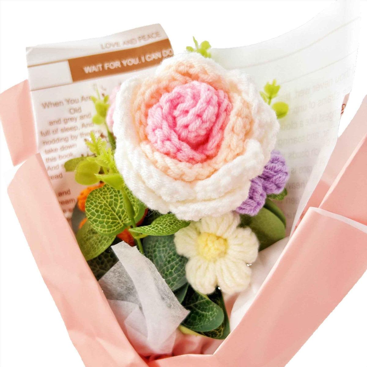 Crochet rose bouquet by Shaketea with pink peach white blooms and green leaves on Tampa Home & Garden Store