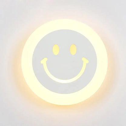 LED Round Wall Sconce by Decorbites with glowing smiley-face design, warm white light on Tampa Home & Garden Store
