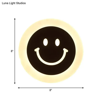 LED Round Wall Sconce 8 inch, black smiley face with warm halo glow by Decorbites on Tampa Home & Garden Store