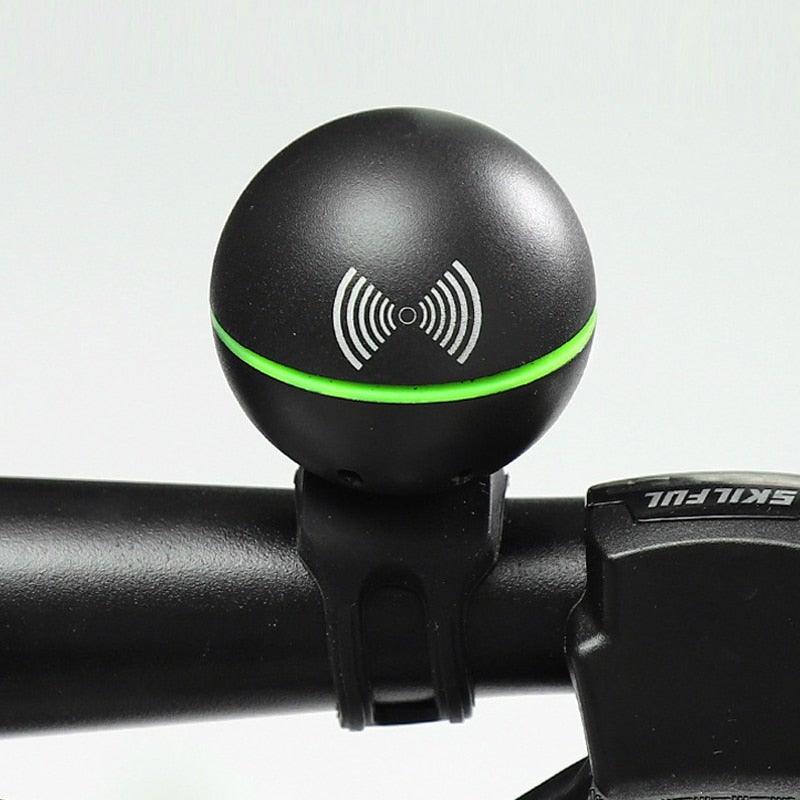 Stevvex round black bicycle bell with green accent mounted on handlebars on Tampa Home & Garden Store