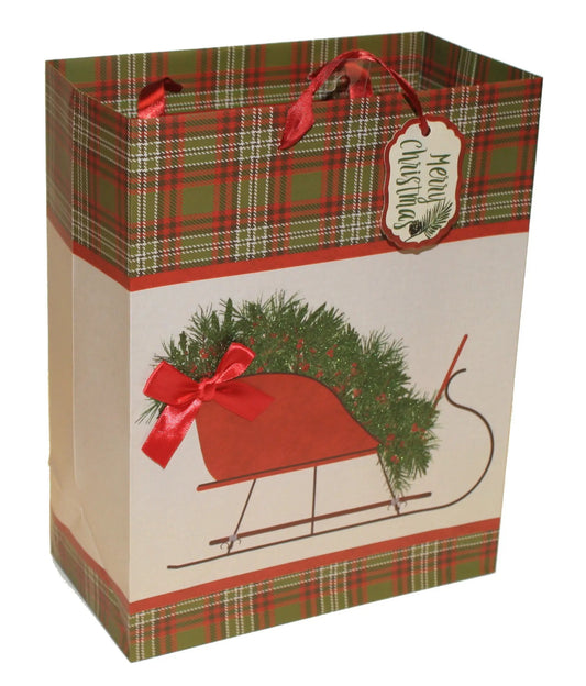 Handmade gift bag with red ribbon handles and green plaid top by Country Christmas Loft on Tampa Home & Garden Store